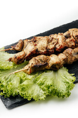 
fresh kebab on skewers on white background