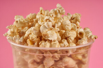 aclose-up transparent popcorn bucket