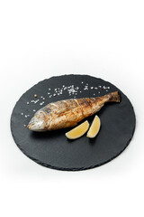 delicious grilled fish on white background