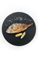 delicious grilled fish on white background