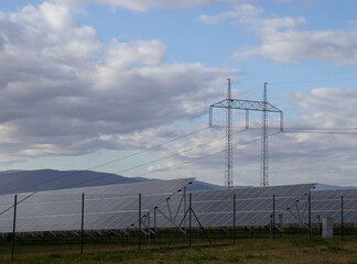 Electric pole and solar panels field