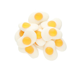 Pile with jelly candies in shape of egg on white background, top view