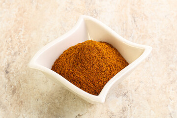 Dry Paprika powder in the bowl
