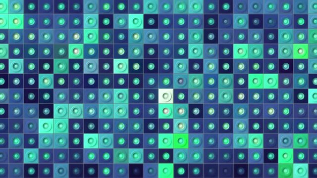Mosaic background of shimmering colored squares with dots. Motion. Bright multicolored background of many squares changing colors. Shimmering multicolored squares with dots in disco style