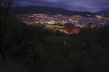 Bilbao at night seen from a hill