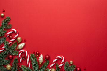 Christmas or New Year red background with fir decor