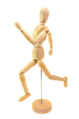 wooden human figurine depicts action