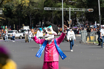 Fototapeta na wymiar Day of the Dead parade at Mexico City at october the 31 of 2021