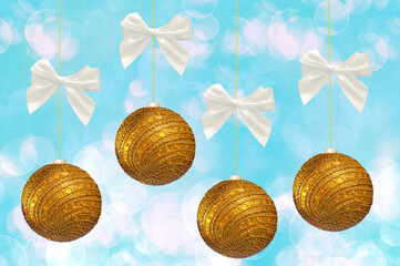 Christmas background with golden christmas balls close up and white ribbons on blue background with bokeh