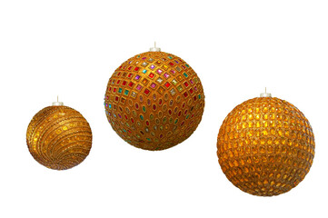 Golden Christmas balls of different sizes close up on white isolated background