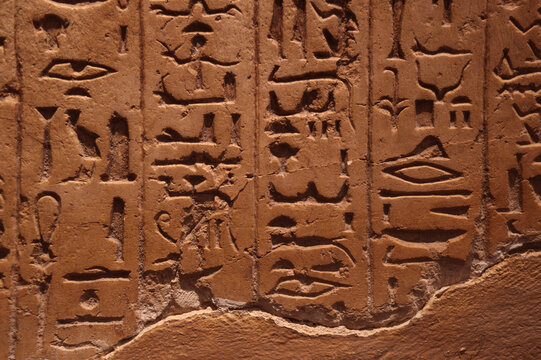 Archeology and Hieroglyphs - Photo of a mysterious inscription in the stone from ancient Egypt 