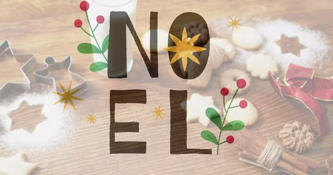 Animation of noel text over christmas cookies