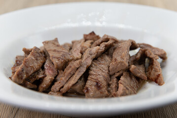 Grilled and sliced Tikka steak served up in a bowl a la carte for some extra protein