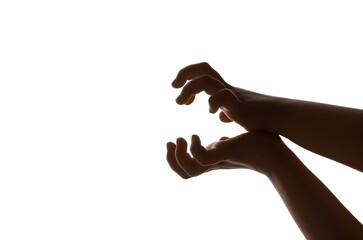 Child performing a shadow play on white background
