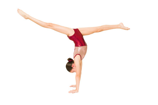Flexible little girl in red leotard doing gymnastic Stock Photo by licsiren