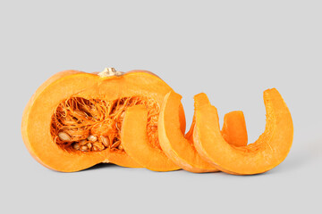 Ripe cut pumpkin on light background