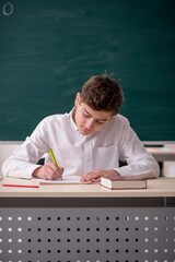 Boy sitting in the classrom