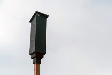 Bat box sits on tall pole
