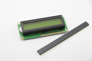 LCD display module with header pins, LCD 16x2 module isolated on white background