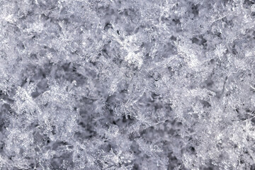 Solid background of transparent snowflakes