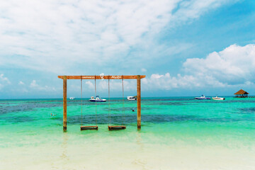 A beach on one of the islands in the Maldives archipelago that is really calm and clean, perfect for holidays