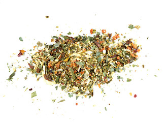 A mixture of seasonings scattered on a white background