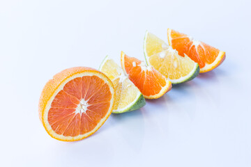 One of Valencia and slice  orange or Navel orange with white background