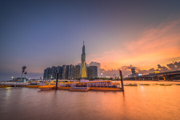 Obraz premium The Landmark 81 - a super-tall skyscraper of Vinhomes Central Park Project, viewed from Binh An waterbus station, Ho Chi Minh city, Vietnam