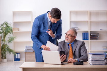 Two colleagues working in the office