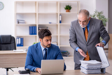 Two colleagues working in the office