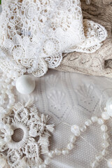 Beautiful delicate white christmas background with beads, balls, new year decor