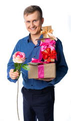 man with gifts. the guy is holding a lot of gifts. businessman congratulates on the holiday. isolated white background