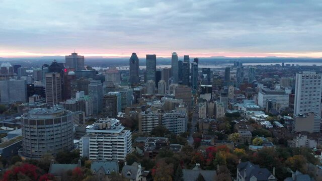 Aerial shot over the city skyline of Montreal, from Mont-Royal Park.
