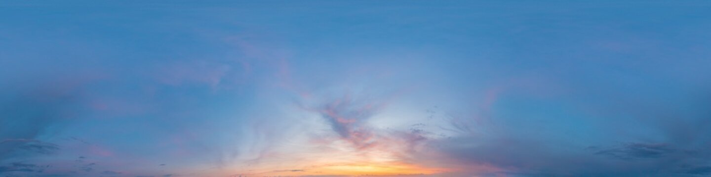 Dark blue sunset sky panorama with Cirrus clouds. Seamless hdr pano in spherical equirectangular format. Complete zenith for 3D visualization, game and sky replacement for aerial drone 360 panoramas.