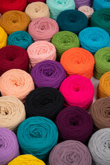 Close-up of multi-colored cotton skeins. Shop assortment for handmade