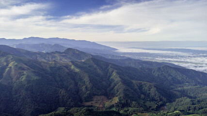Landscape of Doi Sakad mountain valley in Pua, Nan Province, Thailand during rainy season. Photo from aerial view by drone