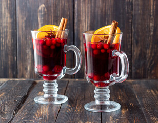Mulled wine with cinnamon, cranberry and orange. Hot drink. Winter.