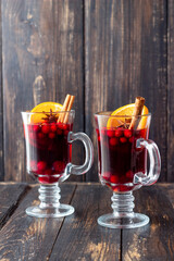 Mulled wine with cinnamon, cranberry and orange. Hot drink. Winter.