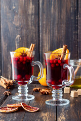 Mulled wine with cinnamon, cranberry and orange. Hot drink. Winter.