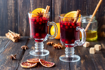 Mulled wine with cinnamon, cranberry and orange. Hot drink. Winter.