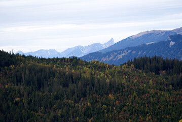 Mountain panorama seen from Axalp at Bernese Highlands on a grey cloudy autumn day. Photo taken October 19th, 2021, Brienz, Switzerland.