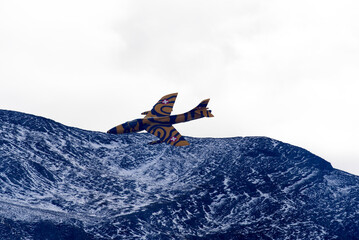 Latest public flight of classic fighter hunter at air show of Axalp on a grey cloudy autumn day. Photo taken October 19th, 2021, Brienz, Switzerland.
