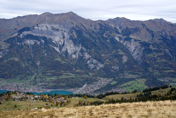 Naklejka premium Aerial view from Axalp at Bernese Highlands to lake Brienz on a cloudy autumn day. Photo taken October 19th, 2021, Brienz, Switzerland.