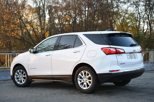 Belarus, Minsk -31.10.2021:2017 Chevrolet Equinox SUV in white. Chevy, a division of General Motors, also makes Suburban, Cruze and Traverse. 