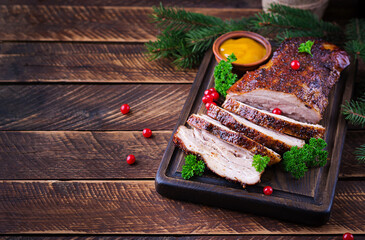 Baked pork belly with herbs. Boiled pork. Festive Christmas table. Top view, overhead