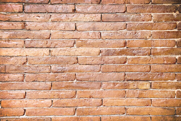 Dark brown brick wall with seamless patterns for grunge background