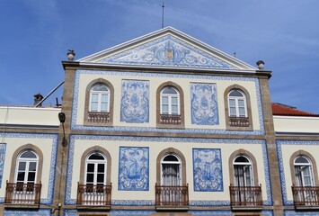 Typical facade of Portuguese houses, decorated with traditional ceramic tiles called 