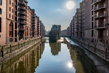 Naklejka premium The famous Speicherstadt of Hamburg at ebb and daylight