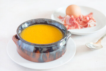 Cream of pumpkin with ham and egg