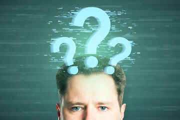 Attractive young caucasian businessman with glowing question marks on digital background. FAQ and...
